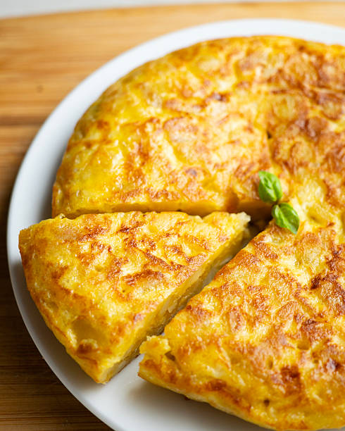 istock Traditional Spanish potato omelet. Step-by-step recipe to learn how to cook. 2240272347