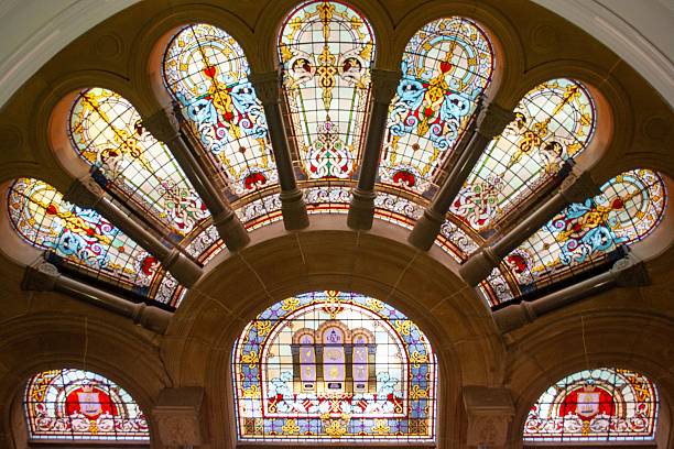 istock Intricate stained glass windows in a historic building. 2240277608