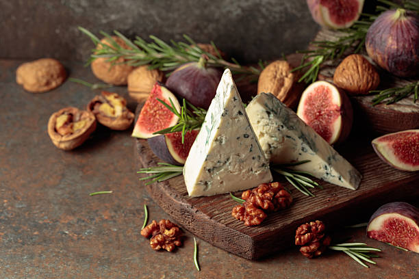 istock Blue cheese with fresh figs, rosemary, and walnuts. 2240277634