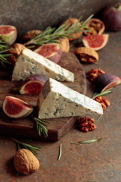 istock Blue cheese with fresh figs, rosemary, and walnuts. 2240277638
