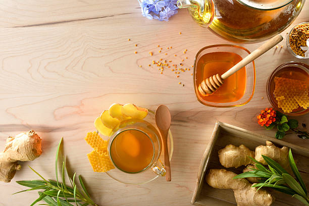 istock Freshly prepared ginger and honey infusion on wooden kitchen bench 2240281165