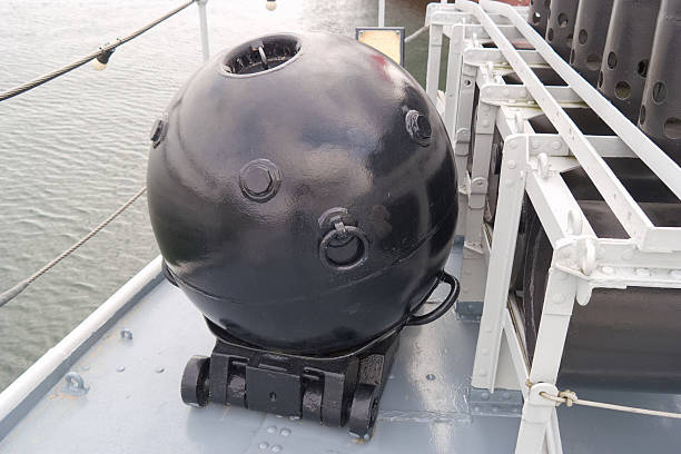 istock Black underwater vehicle on a naval ship deck near the water during daylight hours 2240282482