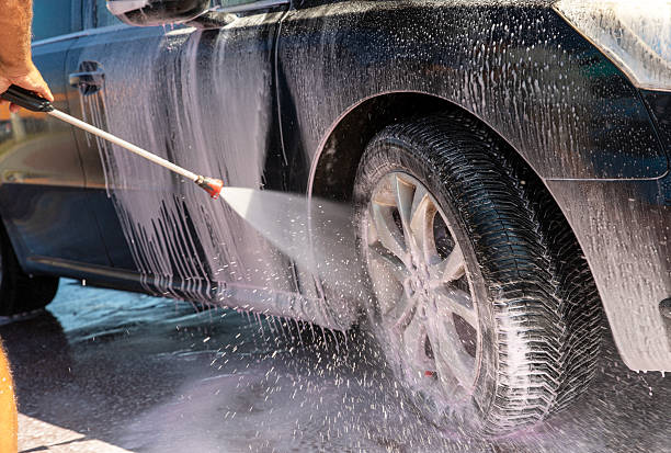 istock Washing a car in self cleaning service 2240288606