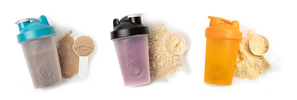 istock Protein powder.protein shake isolated on white background.Shaker bottle with protein.Food supplement.Whey protein powder with shaker for mixing.Sports nutrition.Concept of sports and healthy lifestyle 2240290399