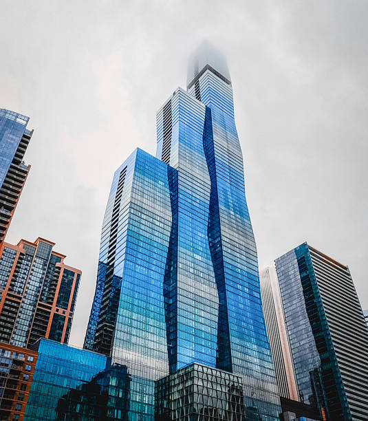 istock Modern Glass Skyscraper Building on the Chicago River in Chicago, Illinois 2240290784