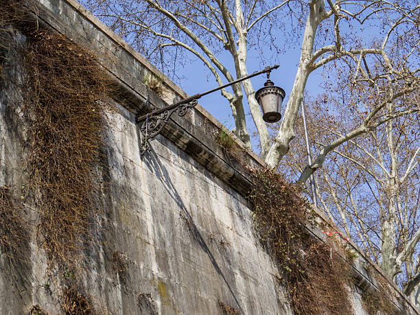 Lamp on the embankment of the River Tiber in Rome, Italy