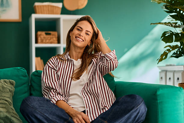 istock Woman smiling at home showing authentic emotion 2240293548