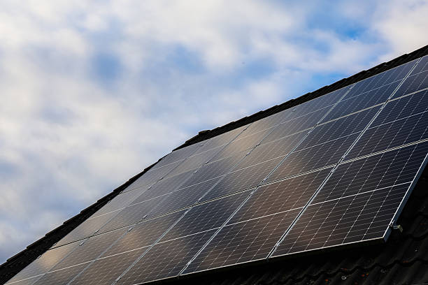 istock Solar panels on roof generating sustainable energy 2240294877