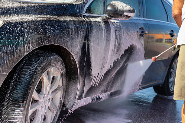 istock Car wash with high pressure gun 2240296931