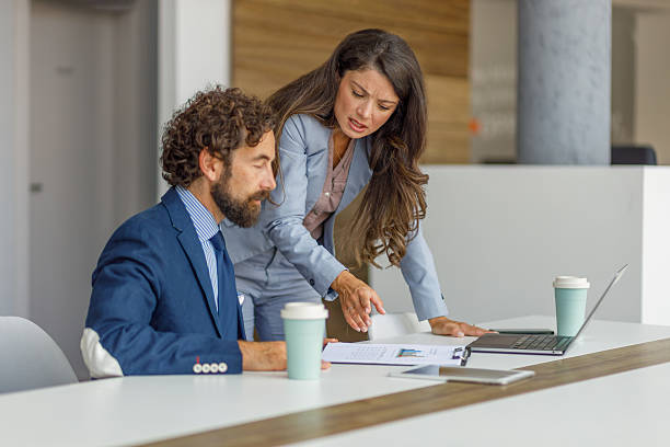 istock Business colleagues having a tense discussion during an office meeting 2240298700