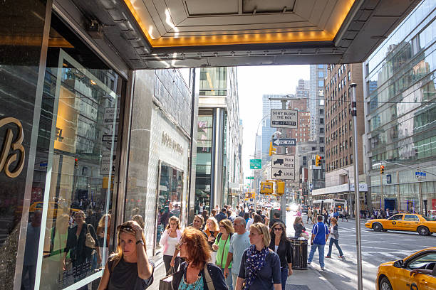 New York City, NY - September 21 2013: New Yorkers walking on Lexington Avenue in Manhattan