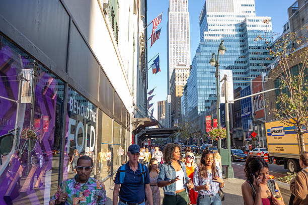 New York City, NY - September 20, 2013,: People walking and shopping on 34th street day in Manhattan, New York