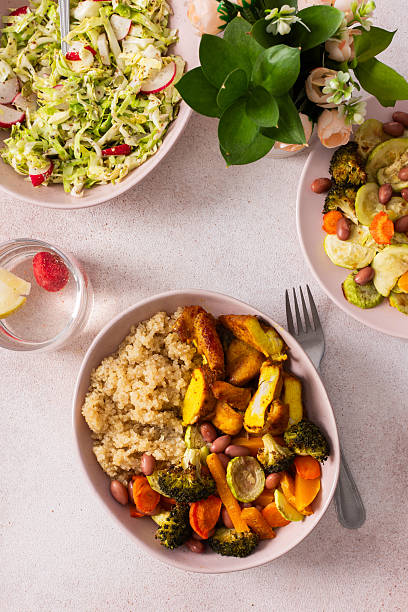istock A nutritious breakfast spread includes quinoa, baked sweet potatoes, carrots, zucchini, broccoli, beans, tender chicken breast, and a vibrant fresh salad, ready for enjoyment 2240312809