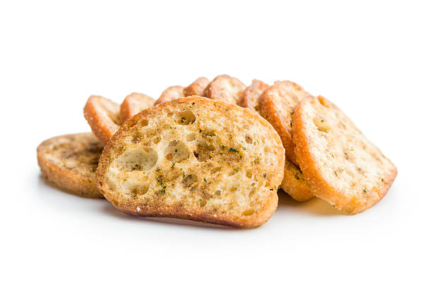 istock Crispy roasted bruschetta bread isolated on white background. 2240316163