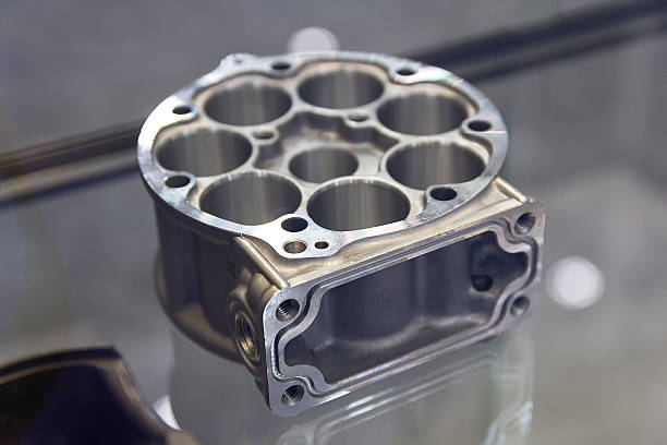 A group of air conditioning compressor cylinders on a display case close-up. Industry