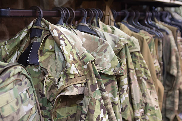 istock Samples camouflage military clothes in the store 2240317969