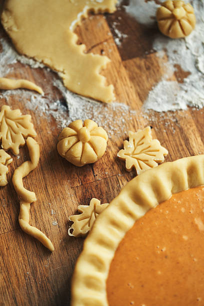 istock Preparing Pumpkin Pie for the Holidays in Domestic Kitchen 2240320188