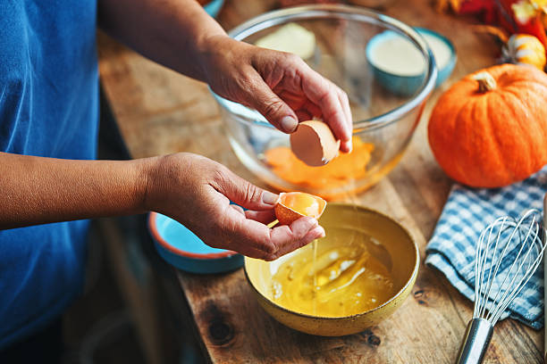 istock Preparing Pumpkin Pie for the Holidays in Domestic Kitchen 2240320261