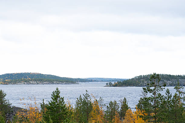 istock Windy northern lake with distant forested islands in autumn 2240320653