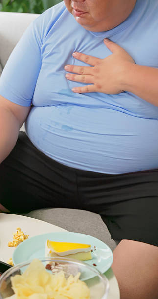 istock junk food experiencing acid reflux 2240326992