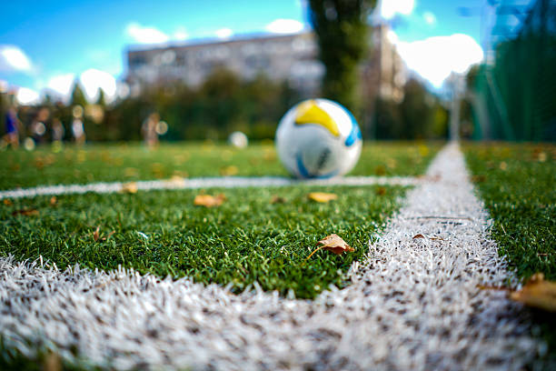istock football training on field (soccer training) 2240327168