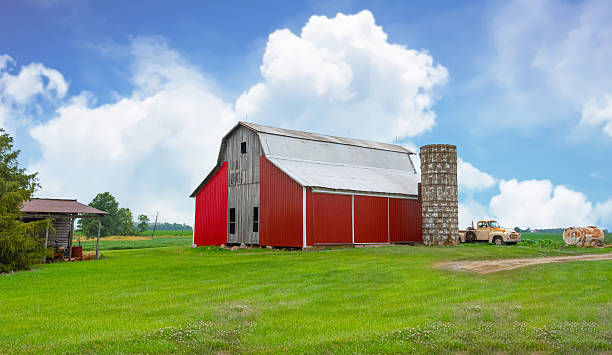 istock Old Weathered Barn with silo and truck-Tipton County, Indiana 2240329201