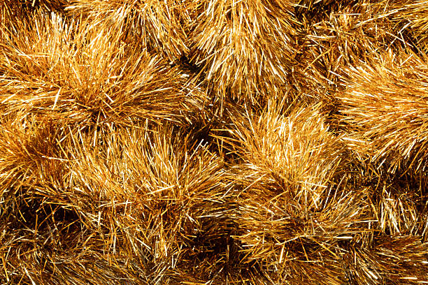 istock Golden tinsel Christmas tree bokeh background 2240332034
