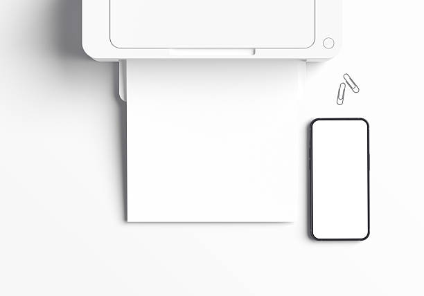 istock Blank A4 paper coming out of printer, Smart phone, Printer mockup, Empty A4 mockup. Perfect for project presentations. 2240334482