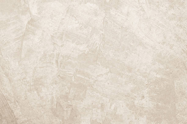istock Colour old concrete wall texture background. Close up retro plain cream color cement wall background texture. 2240339950