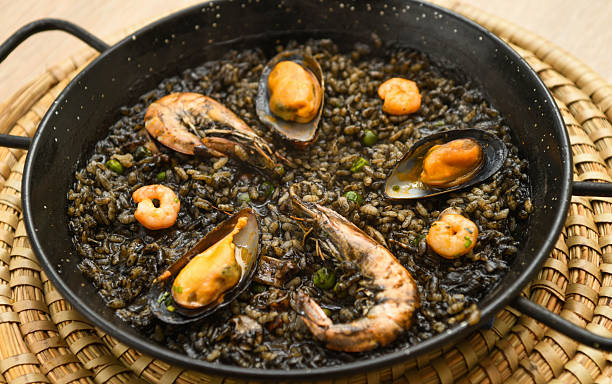 istock Paella with mussels and shrimps in a pan 2240343895
