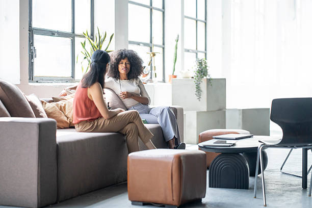 istock Creative businesswomen collaborating during a productive meeting in modern office 2240344728