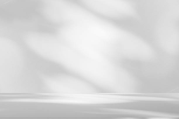 istock Wall interior background, studio and backdrops show products.with shadow from window color white . background for text insertion and presentation product 2240353712
