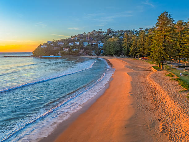istock Ocean Sunrise Under Clear Skies with Orange Horizon 2240357284