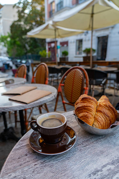 istock Coffee and croissants at an outdoor cafe. 2240360180