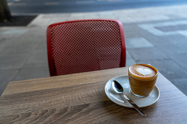 istock Coffee with heart art on a wooden table. 2240360604