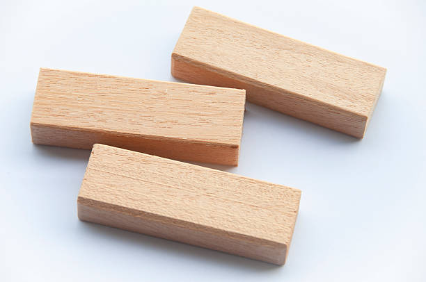 istock Wooden blocks on white background with customizable space for text. 2240363975