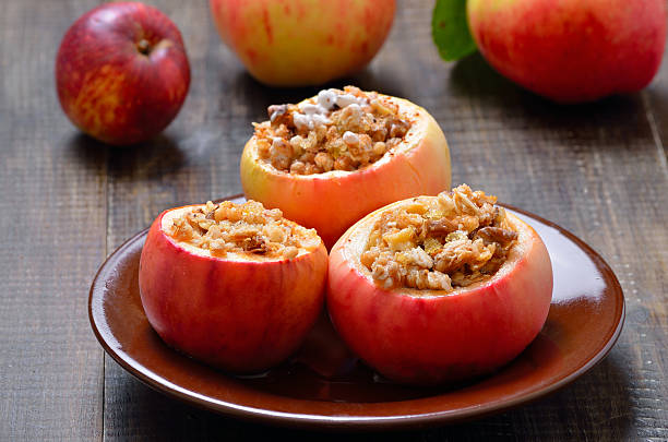 istock Baked apples stuffed with nut, honey and granola 2240371130