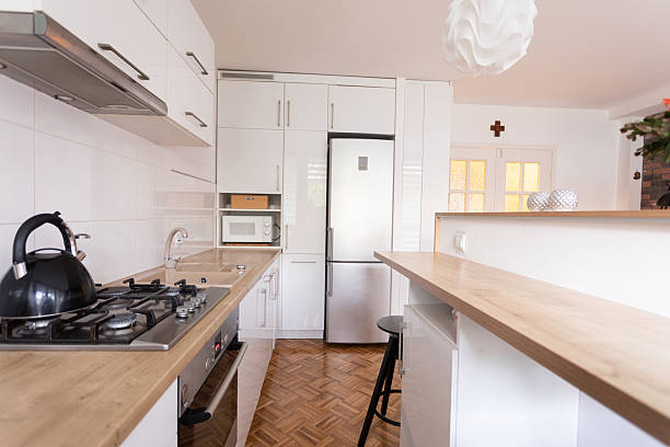 istock A modern kitchen that features a sleek design combined with a warm and cozy atmosphere 2240378221