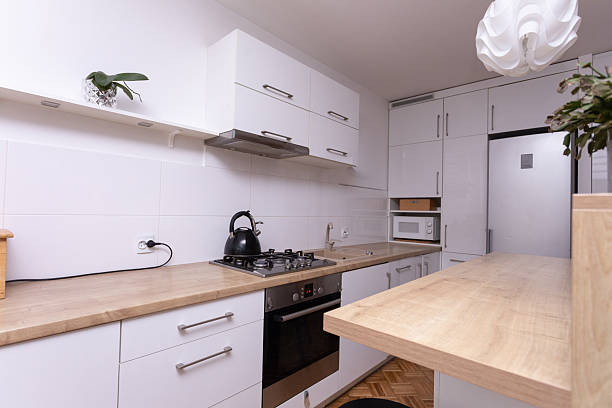 istock Embracing Modern Minimalist Kitchen Style Featuring Sleek Design and Abundant Natural Light 2240379163