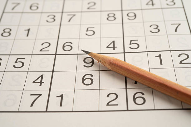 istock Sudoku puzzle, game to play for keep you brain younger for developing Alzheimer disease in senior patient. 2240383708
