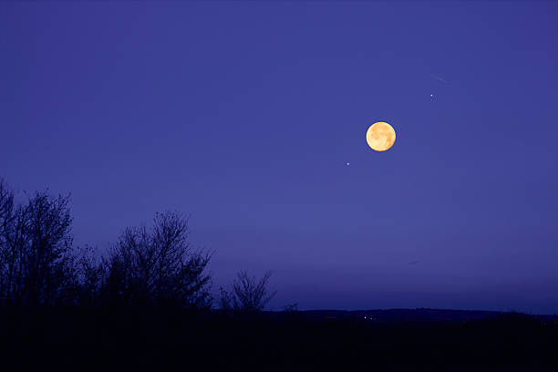 istock Full Moon, stars, planets and landscape scenery silhouettes. 2240384130