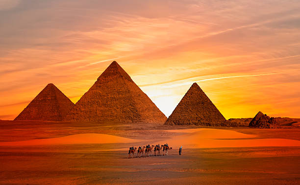 istock Giza Pyramid Complex at amazing sunset sky - Cairo, Egypt 2240386393
