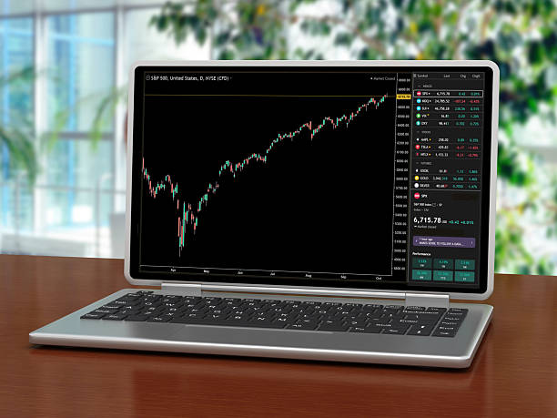 Stock market data on a laptop display, showing dynamic charts, real-time price movements. Digitally Generated Image