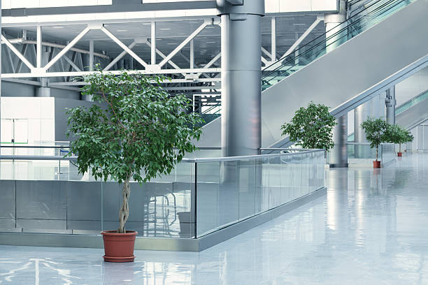istock Modern lobby with escalator and polished floor 2240394441