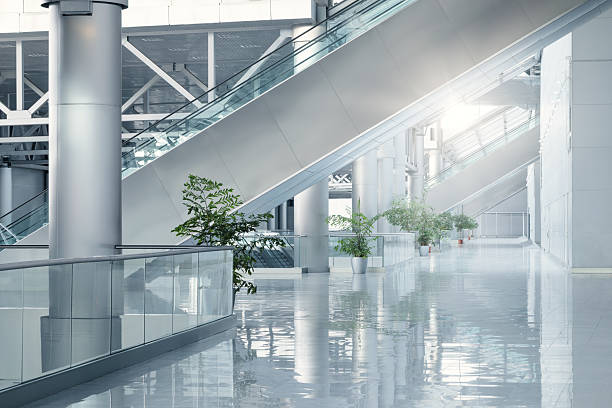 Modern lobby with escalator and polished floor