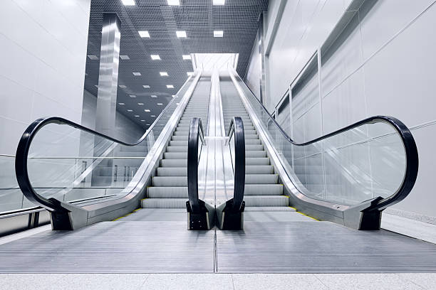 istock Modern twin escalators in a sleek public hall 2240394553
