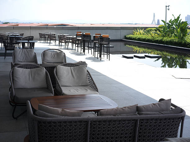istock Outdoor Lounge Area by the Poolside with Comfortable Seating and Scenic Views 2240396018