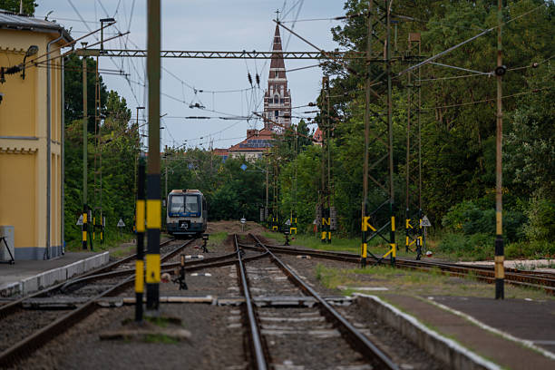 istock Railway station exterior in Szeged under daylight, minimalist composition 2240400076