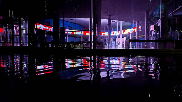 Lusail, Qatar - December 27, 2021:  Pink Fountain reflection at Lusail Marina Park. Dancing Fountain