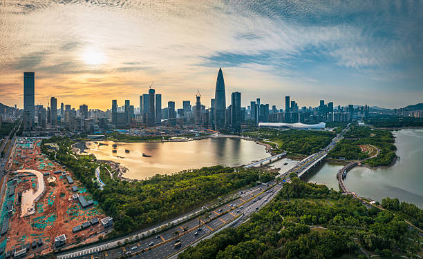 istock Modern city with a skyline, green parks, and complex highway systems in Shenzhen. 2240404483